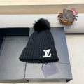 KNITTED BEANIE HAT IN BLACK WOOL 413369