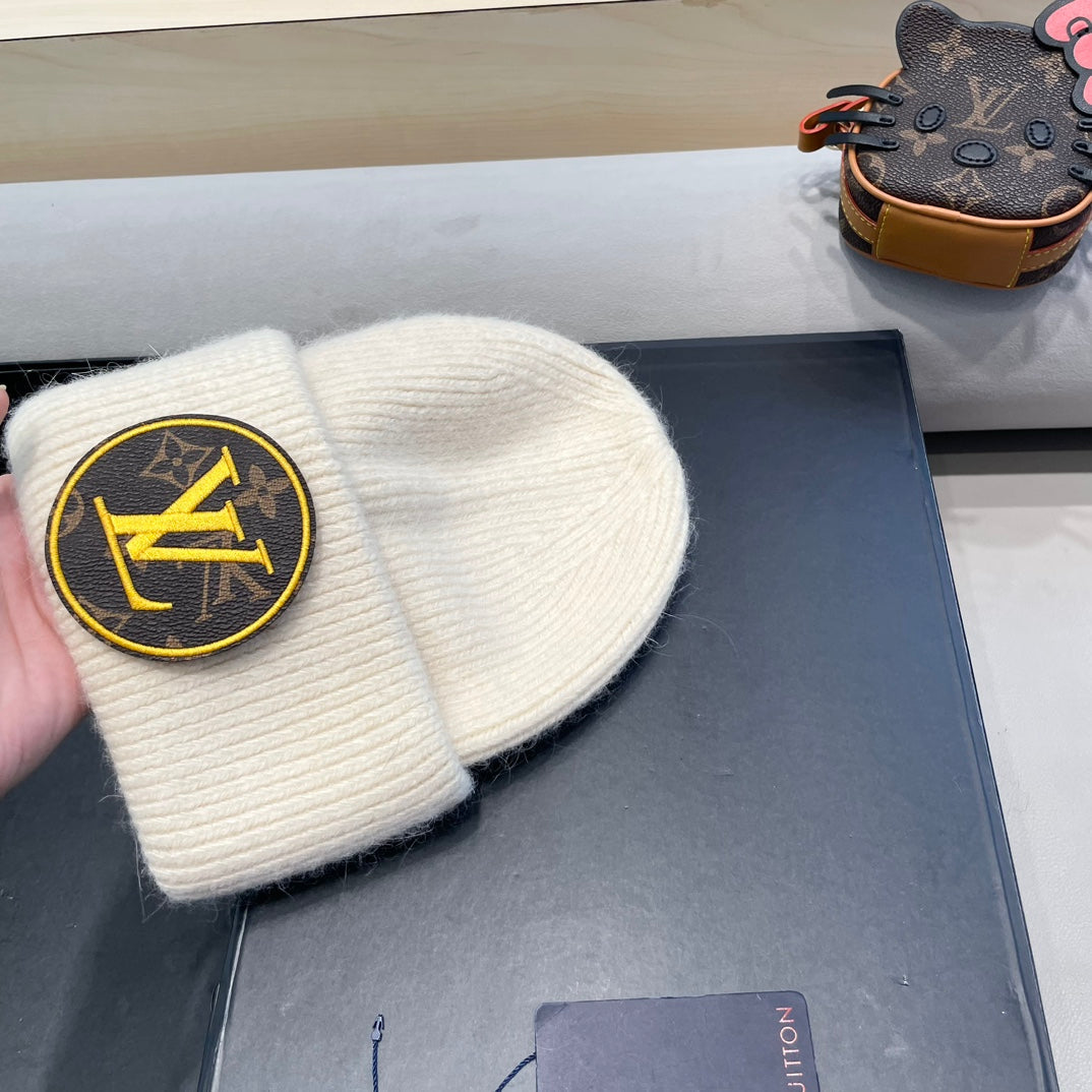 KNITTED BEANIE HAT IN BEIGE WOOL AND RABBIT FUR 417758