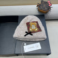 BEANIE HAT IN CAMEL BEIGE WOOL WITH BOW 421255