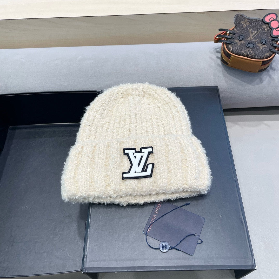 KNITTED BEANIE HAT IN LIGHT BEIGE WOOL 421267