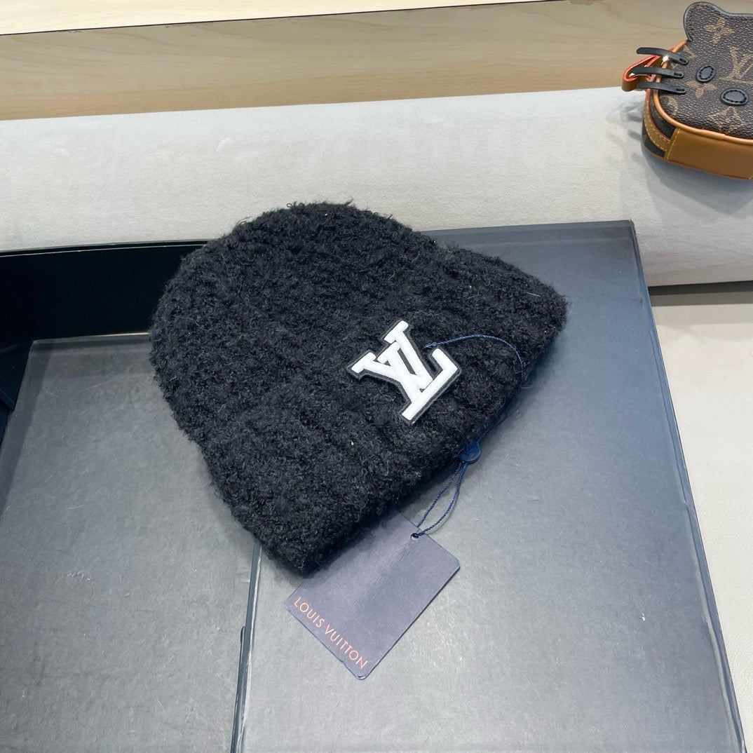 KNITTED BEANIE HAT IN BLACK WOOL 421268