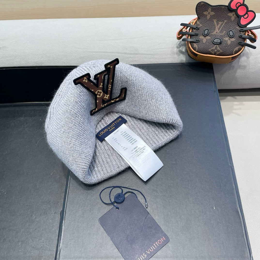 KNITTED BEANIE HAT IN GRAY FLEECE AND WOOL 426206