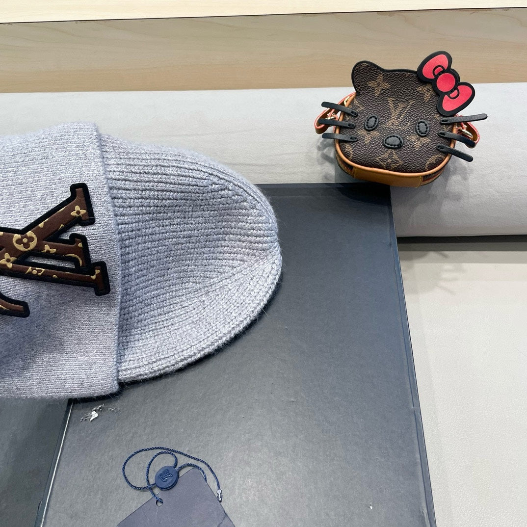 KNITTED BEANIE HAT IN GRAY FLEECE AND WOOL 426206