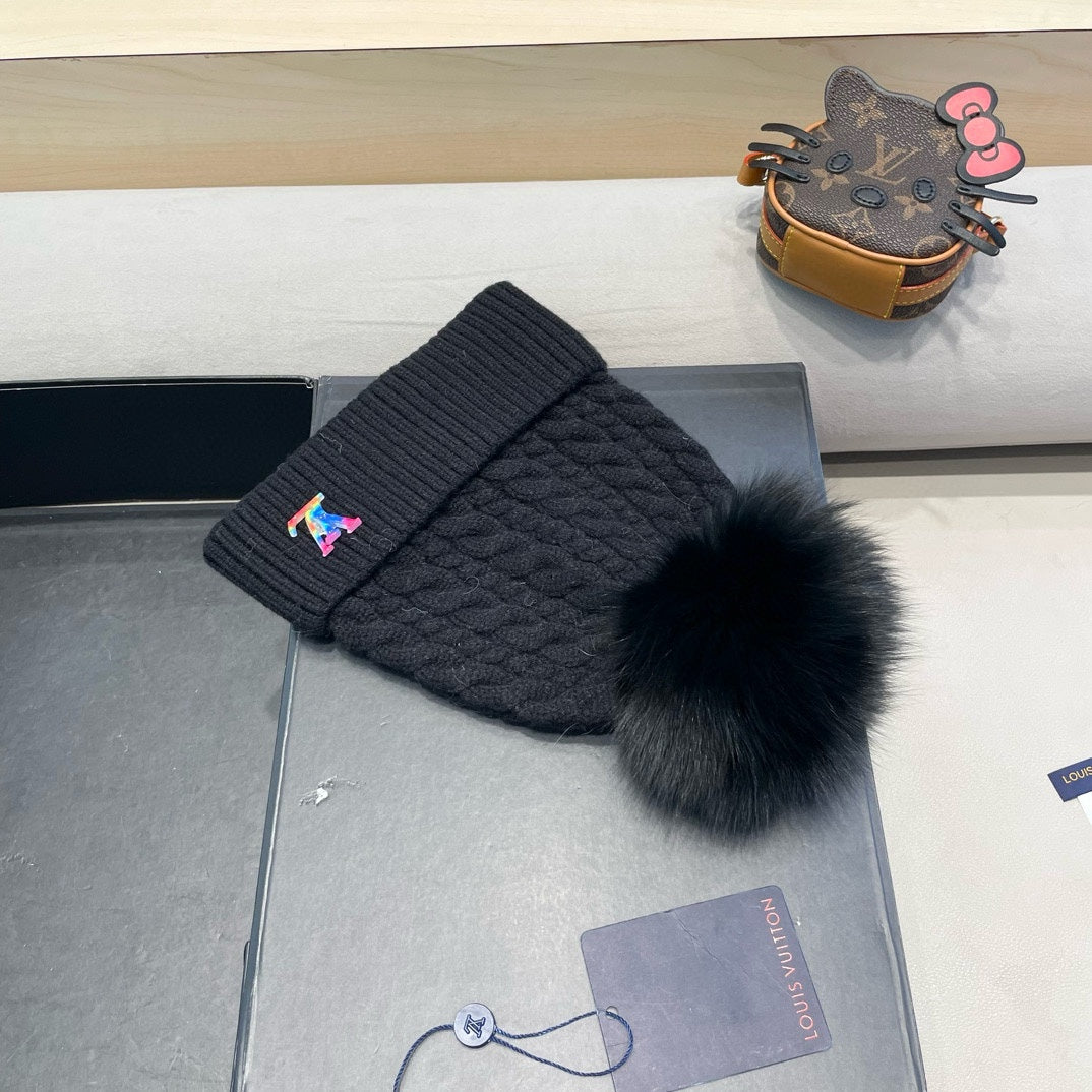 KNITTED BEANIE HAT IN BLACK WOOL 426217