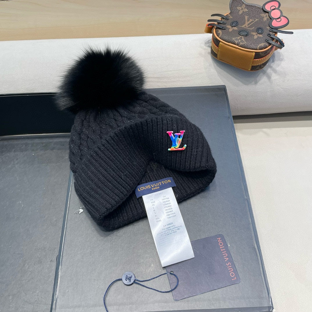 KNITTED BEANIE HAT IN BLACK WOOL 426217