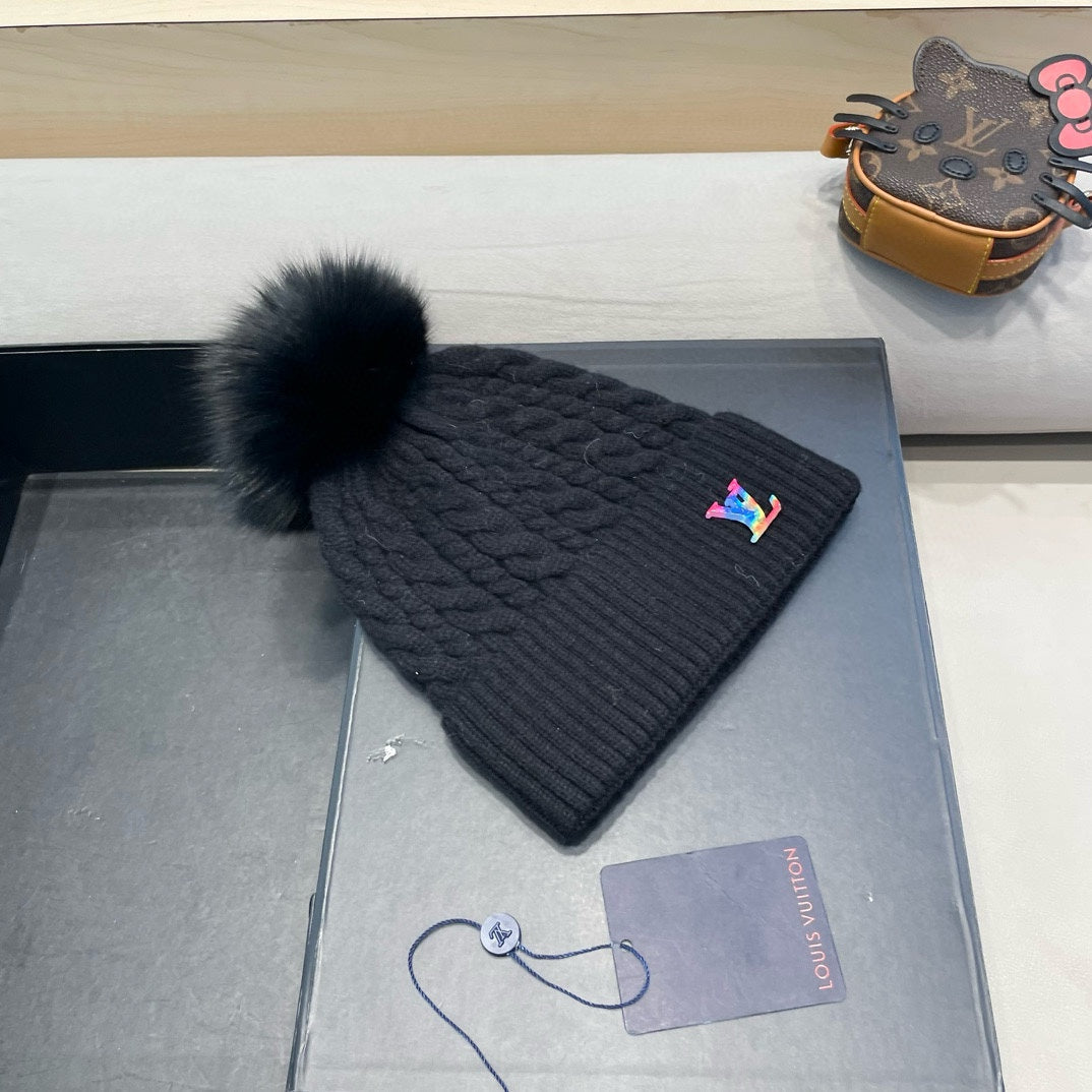 KNITTED BEANIE HAT IN BLACK WOOL 426217