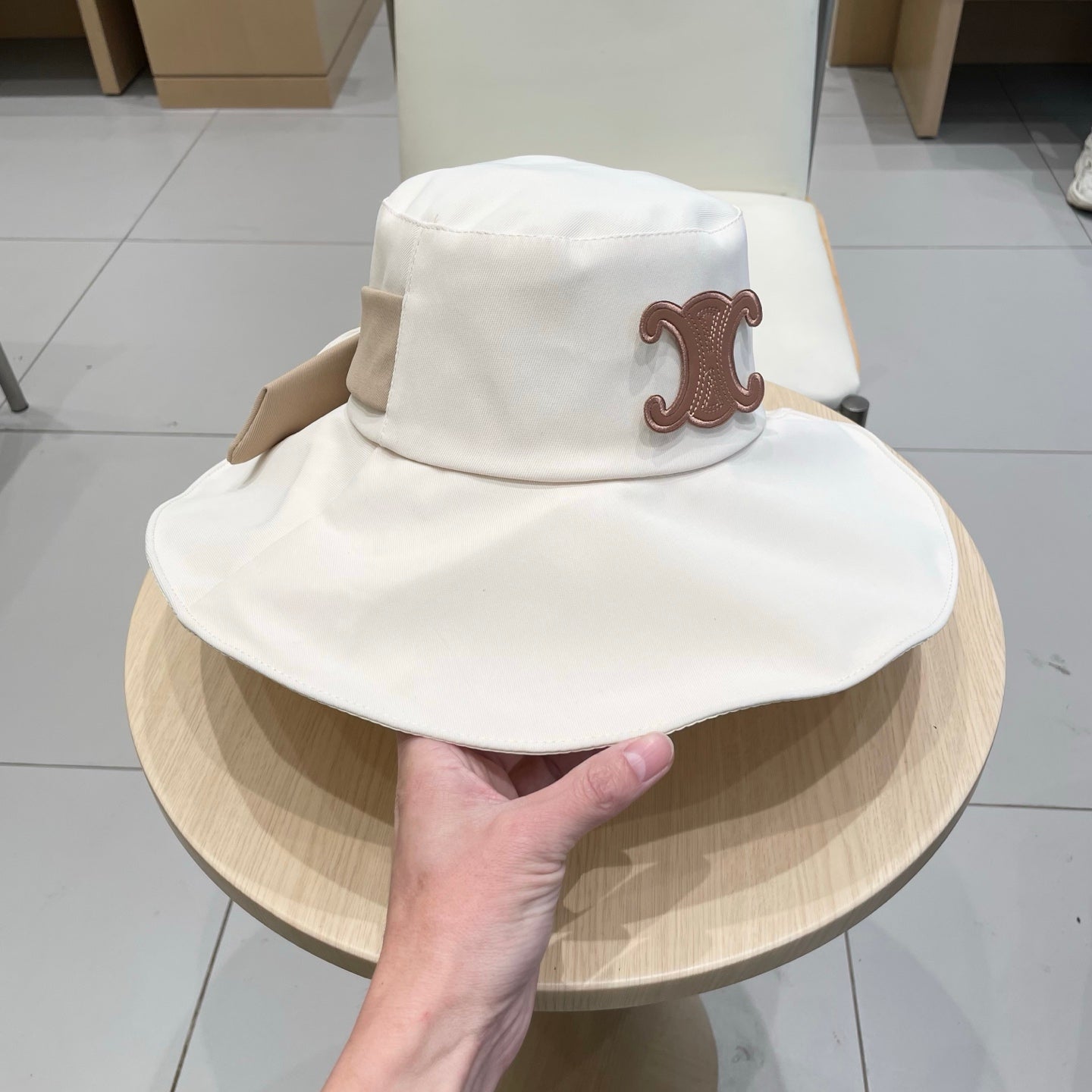 CELINE 25S BUCKET HAT 735013 IN IVORY
