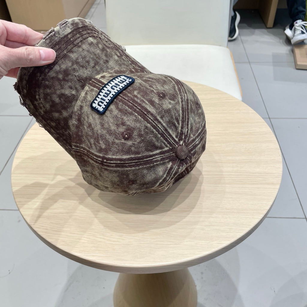 MM DISTRESSED FABRIC BASEBALL CAP IN BROWN WITH EMBROIDERED LOGO