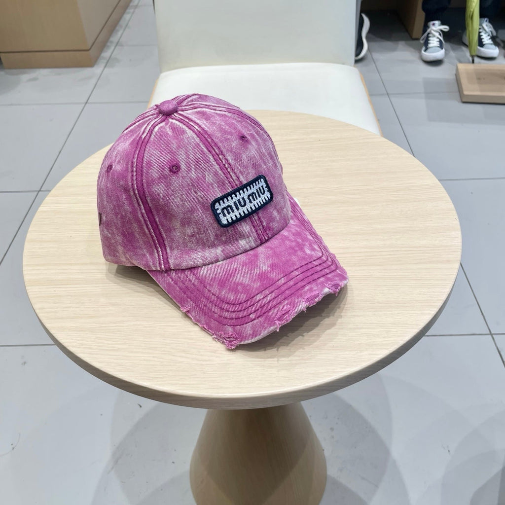 MM DISTRESSED FABRIC BASEBALL CAP IN PINK WITH EMBROIDERED LOGO