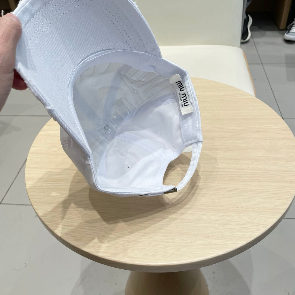 MM DISTRESSED FABRIC BASEBALL CAP IN WHITE WITH EMBROIDERED LOGO