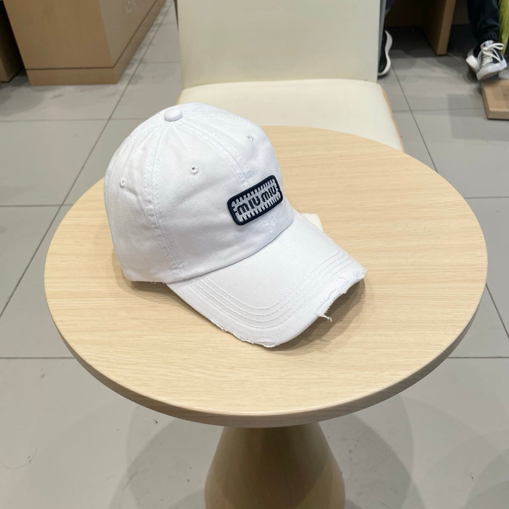 MM DISTRESSED FABRIC BASEBALL CAP IN WHITE WITH EMBROIDERED LOGO