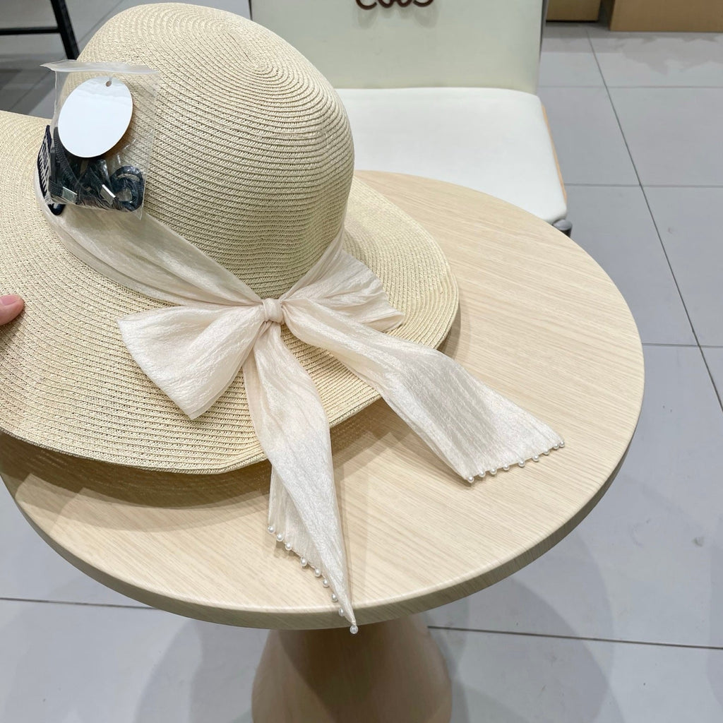 MM WIDE-BRIM BEACH HAT IN LIGHT BEIGE WITH FABRIC BOW