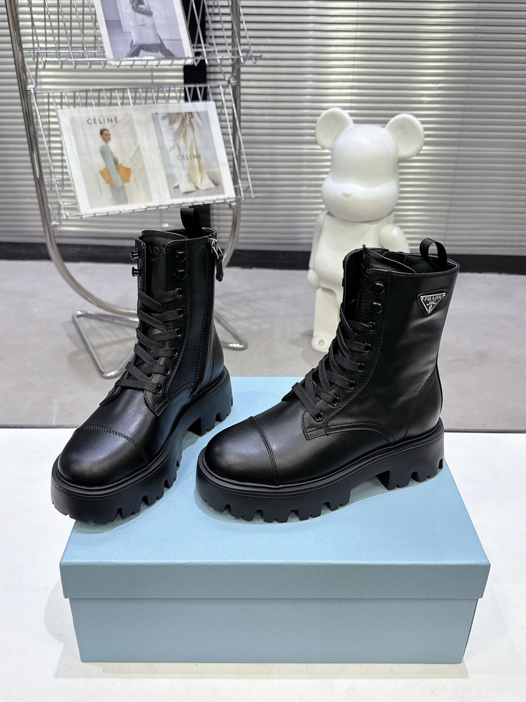 PRADA 25S WARRIOR BOOTS IN BLACK CALFSKIN
