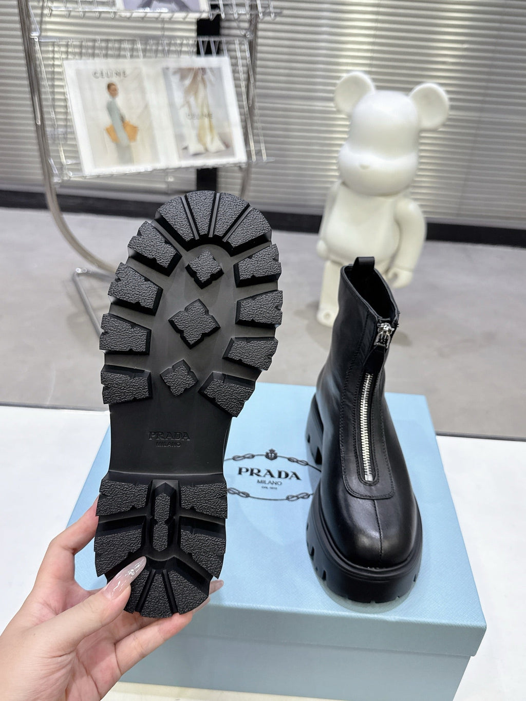 PRADA 25S ZIP-UP ANKLE BOOTS IN BLACK CALFSKIN