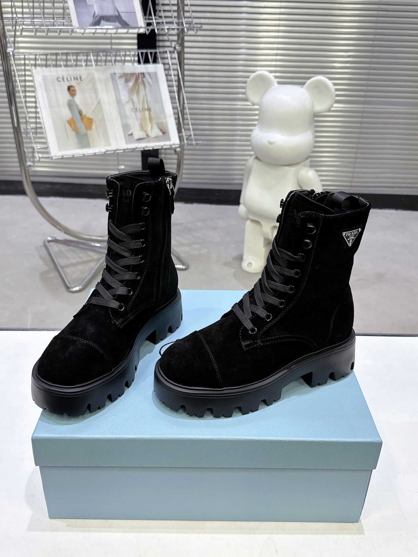 PRADA 25S WARRIOR BOOTS IN BLACK SUEDE