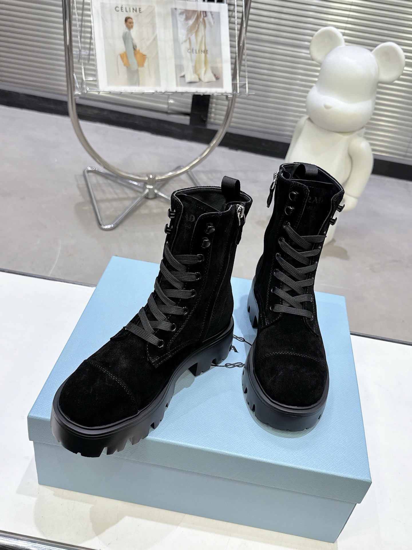 PRADA 25S WARRIOR BOOTS IN BLACK SUEDE
