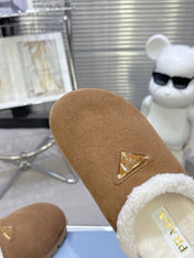 PRADA 25S FUR-LINED MULES IN BROWN SUEDE