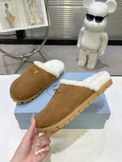 PRADA 25S FUR-LINED MULES IN BROWN SUEDE