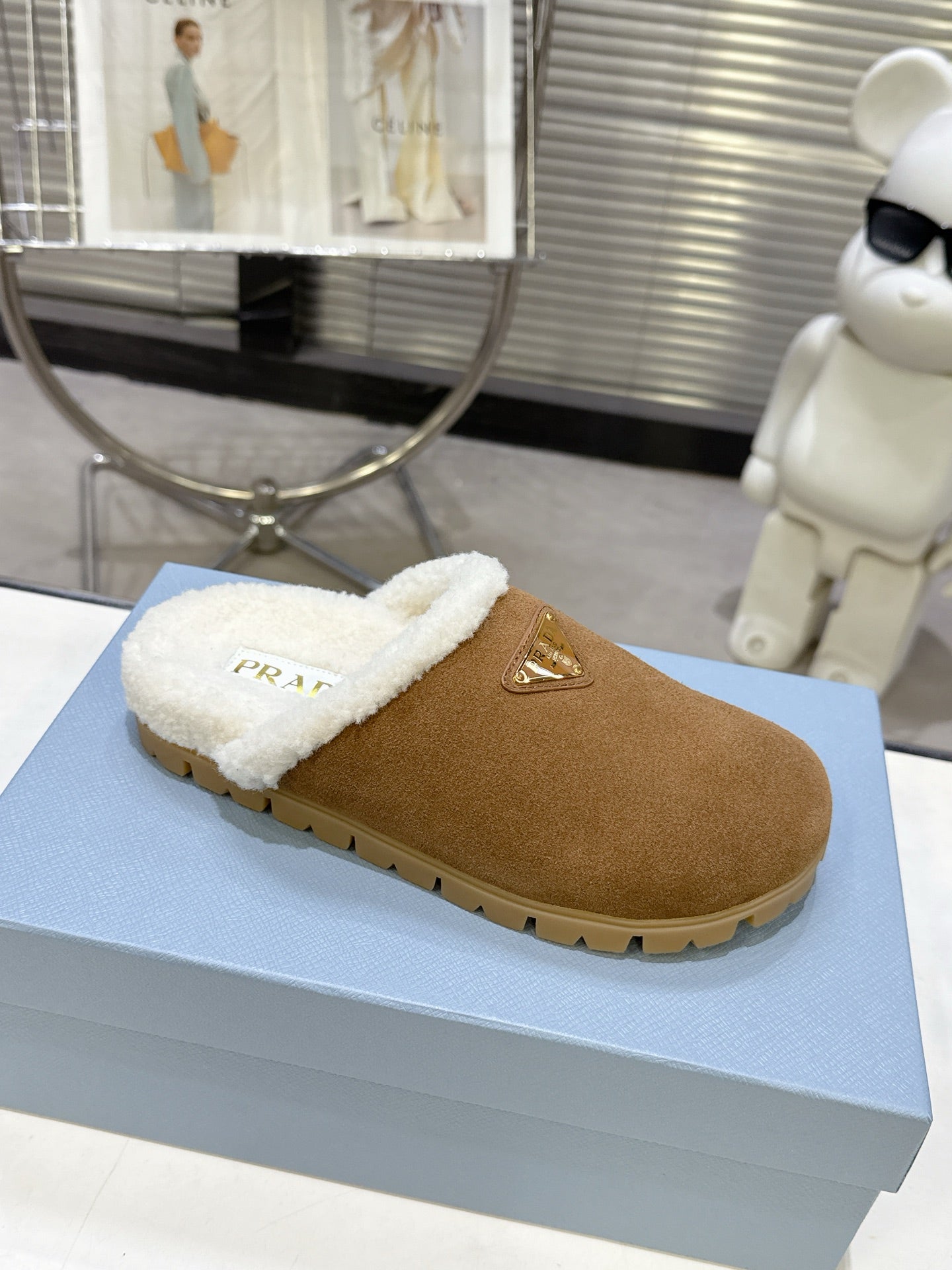 PRADA 25S FUR-LINED MULES IN BROWN SUEDE