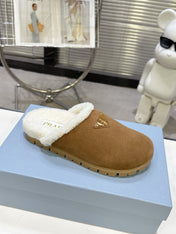 PRADA 25S FUR-LINED MULES IN BROWN SUEDE