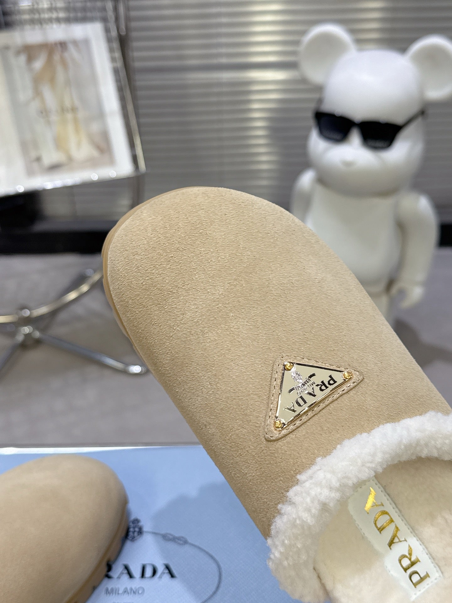 PRADA 25S FUR-LINED MULES IN BEIGE SUEDE