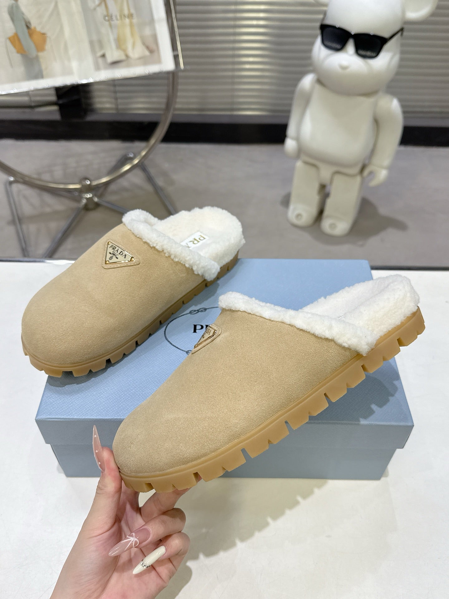 PRADA 25S FUR-LINED MULES IN BEIGE SUEDE