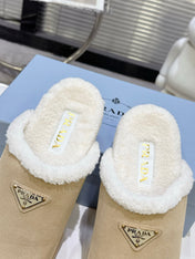 PRADA 25S FUR-LINED MULES IN BEIGE SUEDE