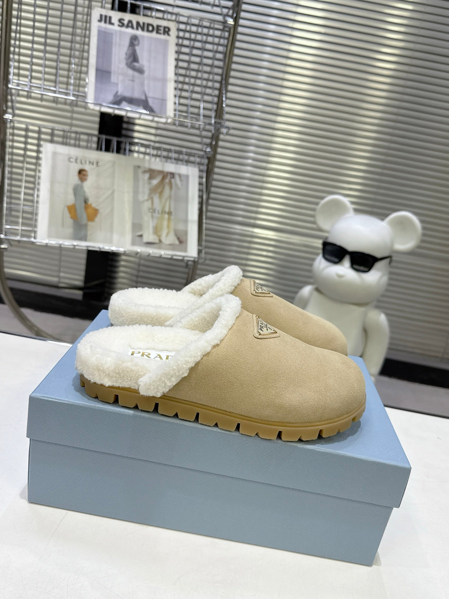 PRADA 25S FUR-LINED MULES IN BEIGE SUEDE