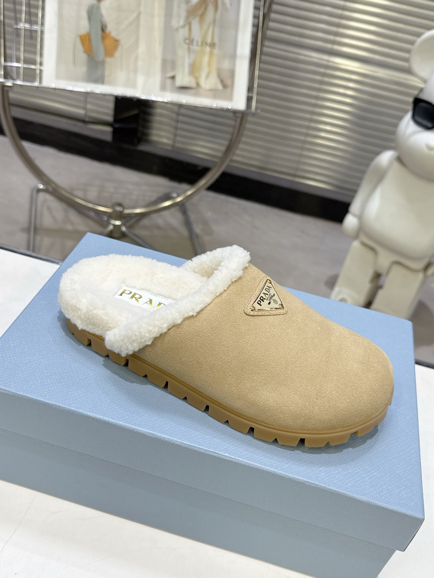 PRADA 25S FUR-LINED MULES IN BEIGE SUEDE