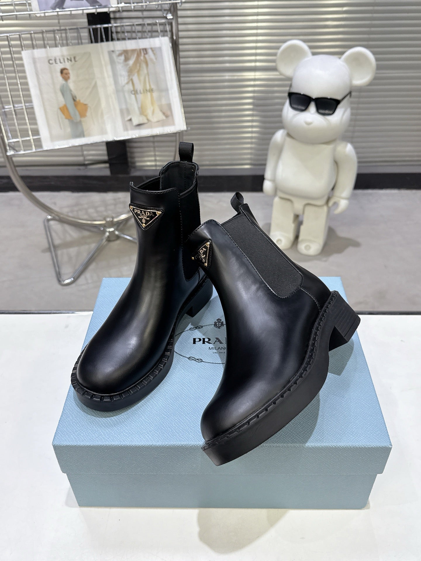 PRADA 25S RETRO PLATFORM MARTIN BOOTS IN BLACK CALFSKIN