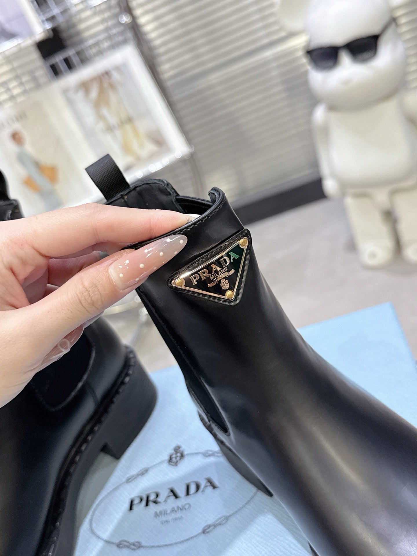 PRADA 25S RETRO PLATFORM MARTIN BOOTS IN BLACK CALFSKIN