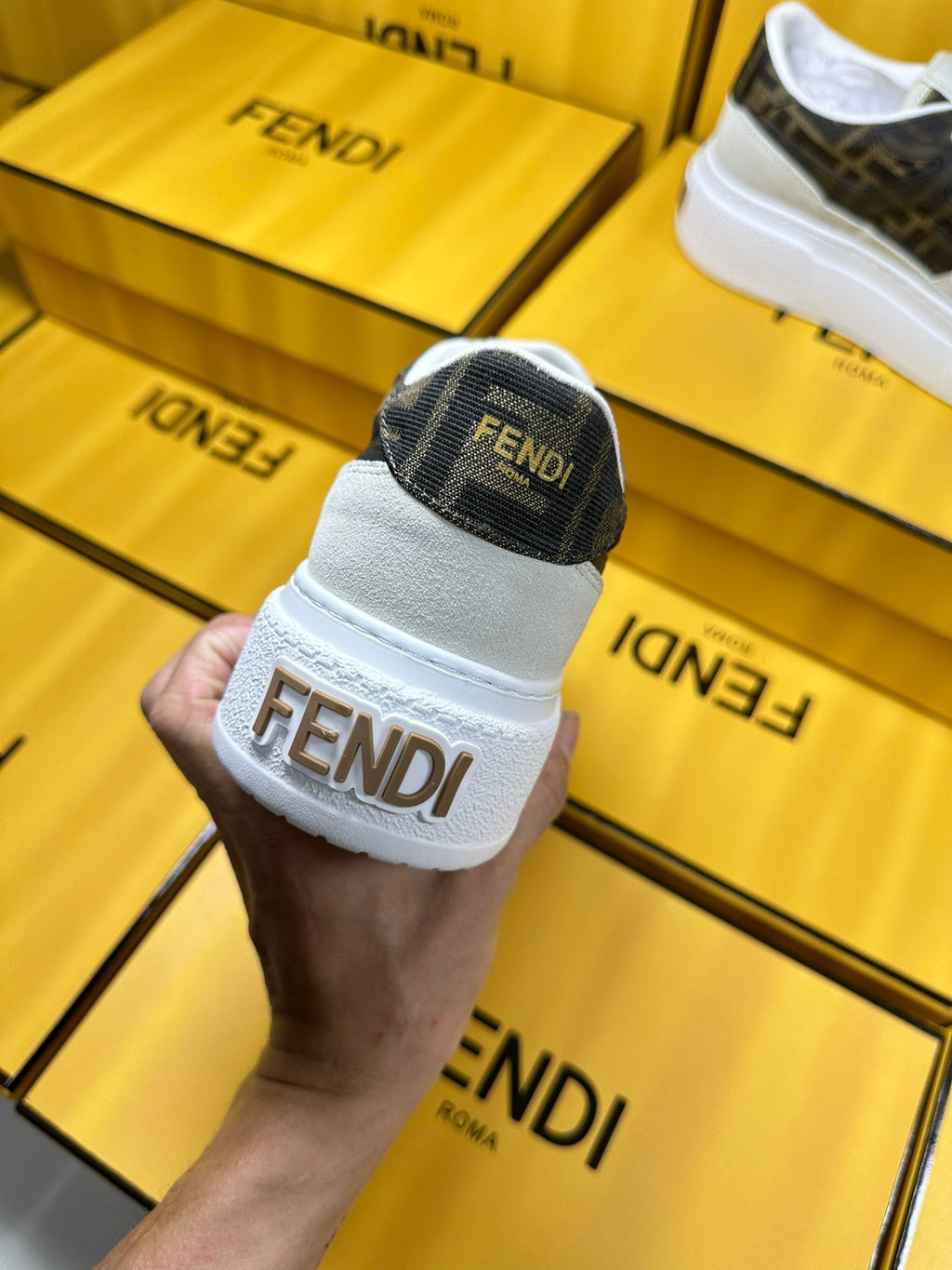 FENDI THICK-SOLDED SNEAKER IN WHITE SUEDE AND BROWN MONOGRAM FABRIC