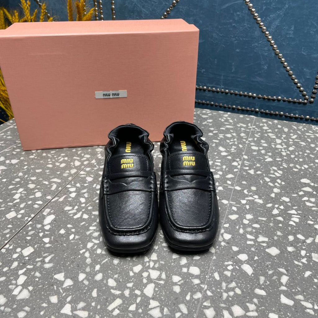 HIGH BROGUE LOAFERS IN BLACK LAMBSKIN