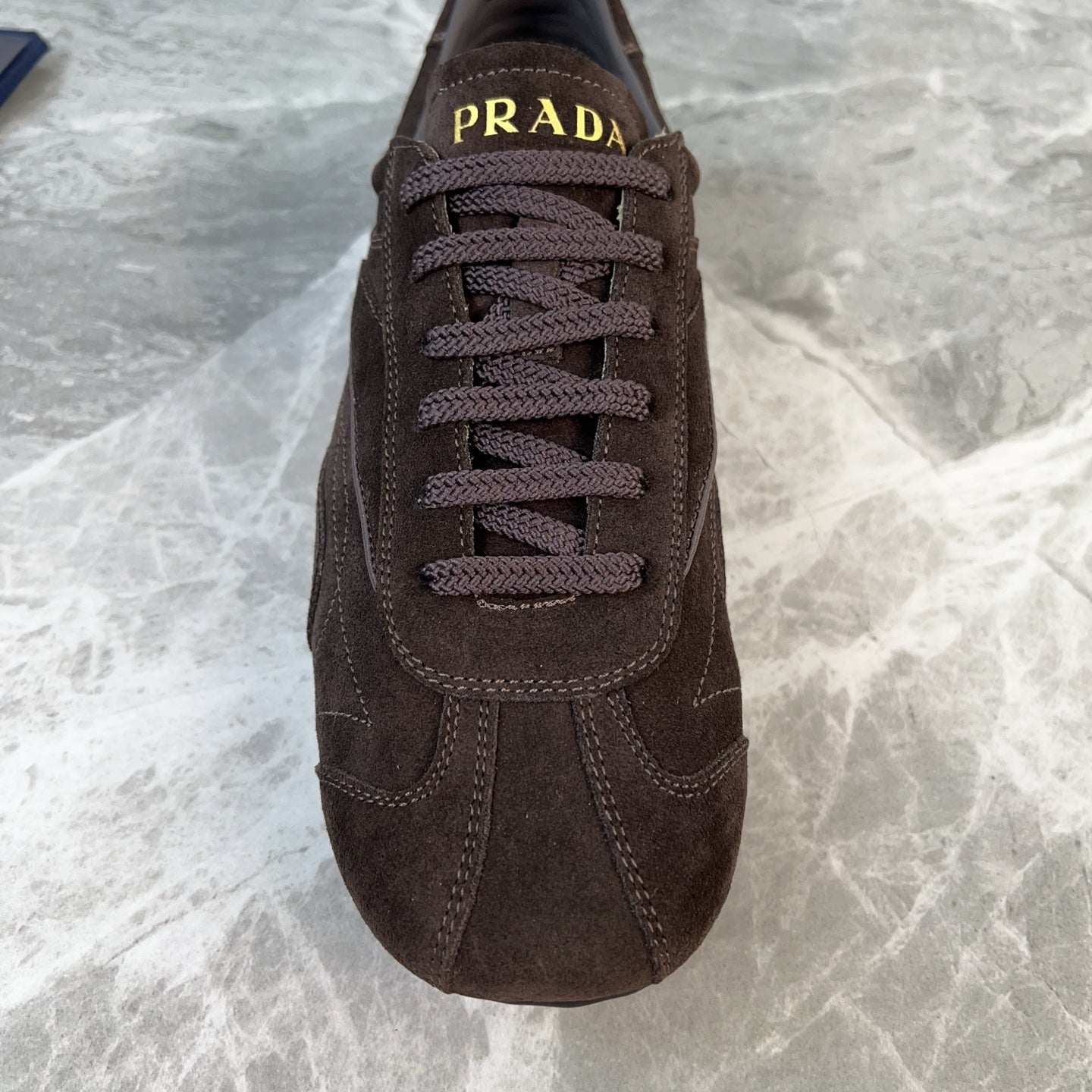 PRADA 25S MONTECARLO ANTIQUED SNEAKERS IN DARK BROWN SUEDE