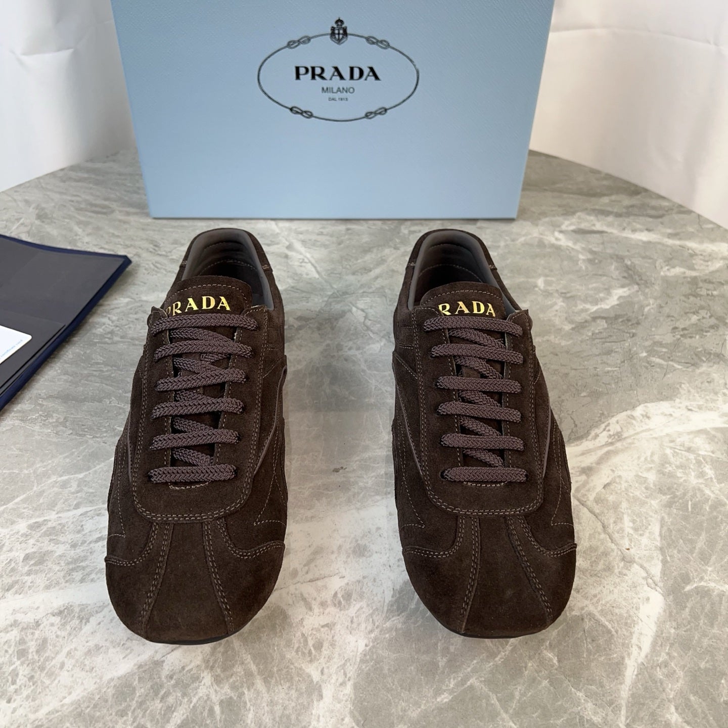 PRADA 25S MONTECARLO ANTIQUED SNEAKERS IN DARK BROWN SUEDE