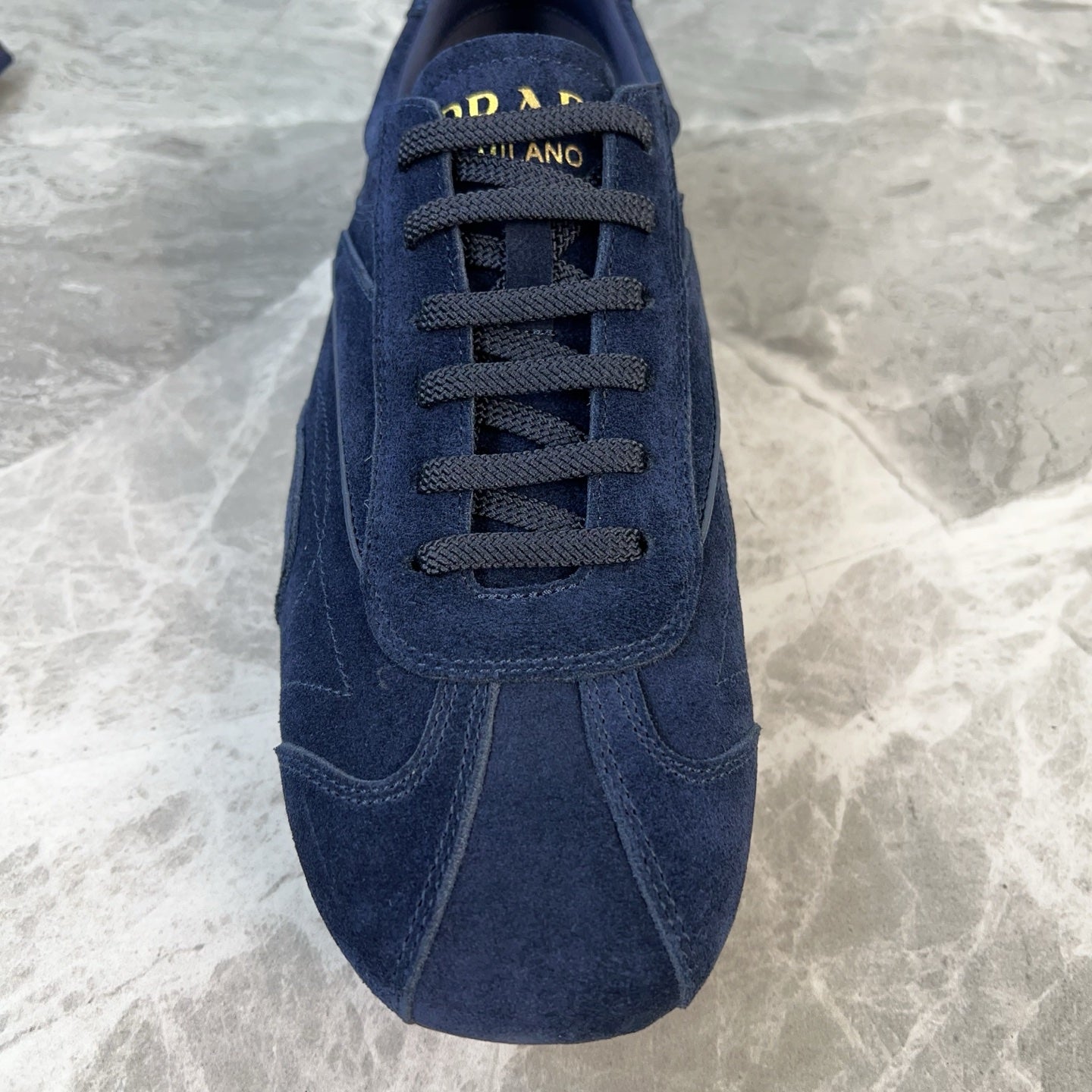PRADA 25S MONTECARLO ANTIQUED SNEAKERS IN NAVY BLUE SUEDE
