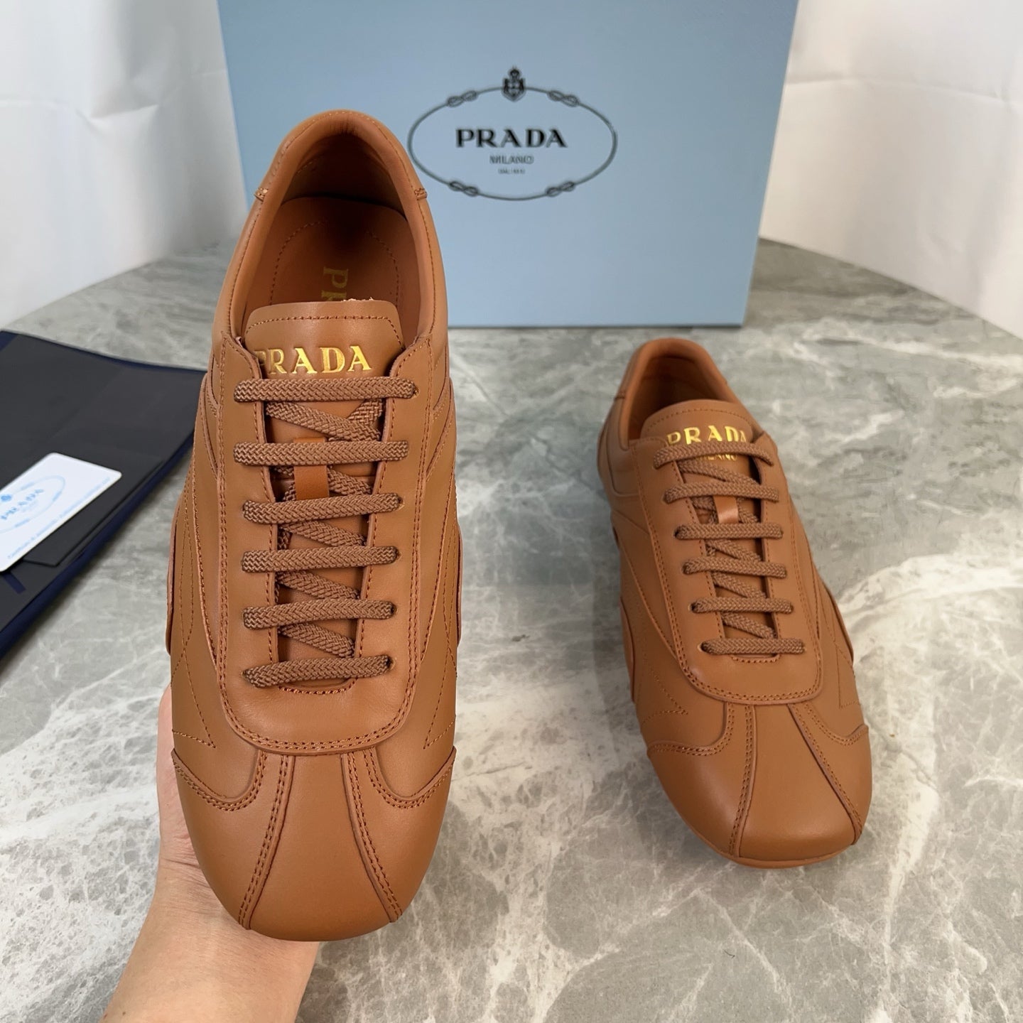 PRADA 25S MONTECARLO ANTIQUED SNEAKERS IN CARAMEL NAPPA LEATHER