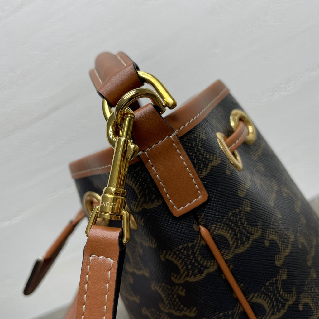 CLARA BAG 19 IN BLACK TRIOMPHE CANVAS AND BROWN CALFSKIN TRIM