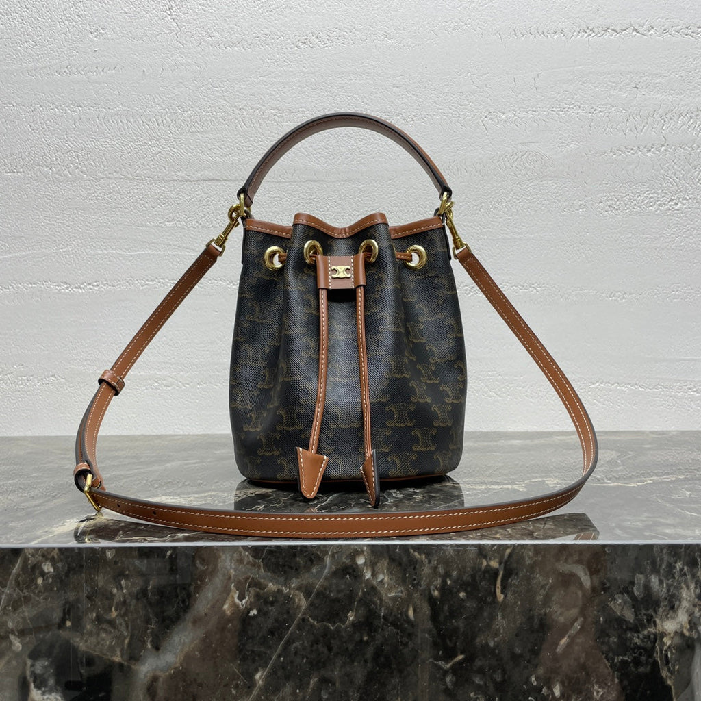 CLARA BAG 19 IN BLACK TRIOMPHE CANVAS AND BROWN CALFSKIN TRIM