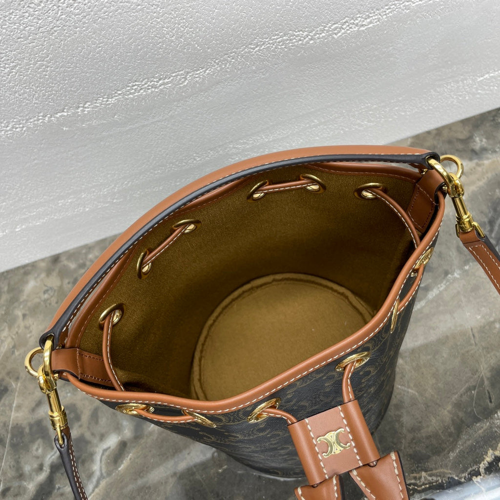 CLARA BAG 19 IN BLACK TRIOMPHE CANVAS AND BROWN CALFSKIN TRIM