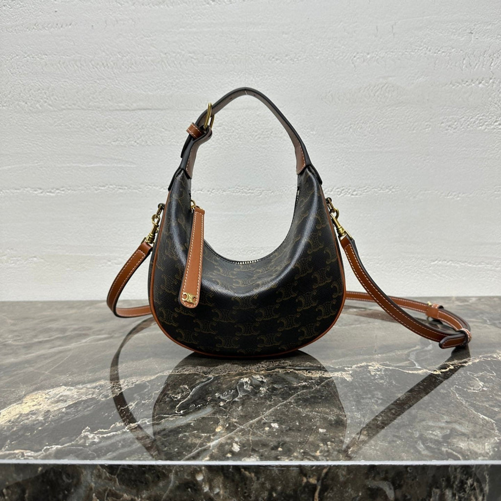 CELINE 25S TEEN LULU BAG 24 IN BLACK TRIOMPHE CANVAS AND BROWN CALFSKIN TRIM