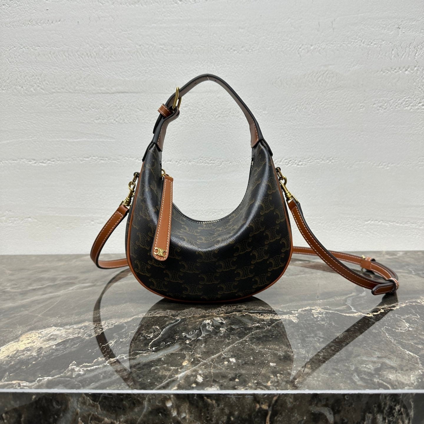 CELINE 25S TEEN LULU BAG 24 IN BLACK TRIOMPHE CANVAS AND BROWN CALFSKIN TRIM