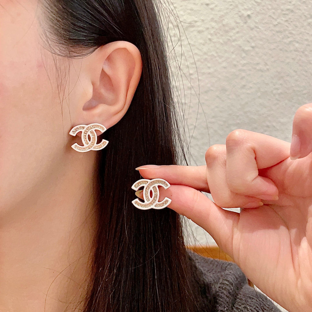 DOUBLE C STUD EARRINGS WITH WHITE TRIM AND CENTER STONE