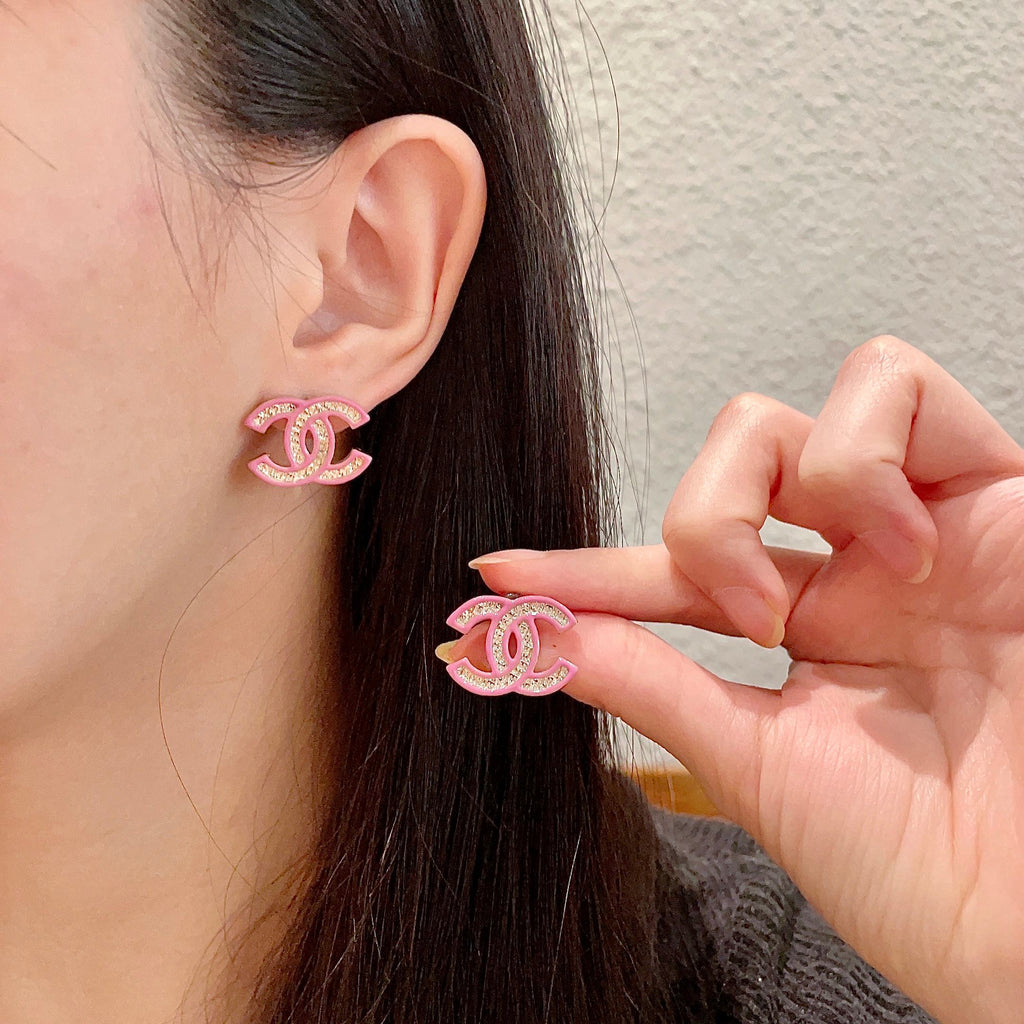DOUBLE C STUD EARRINGS WITH PINK TRIM AND CENTER STONE