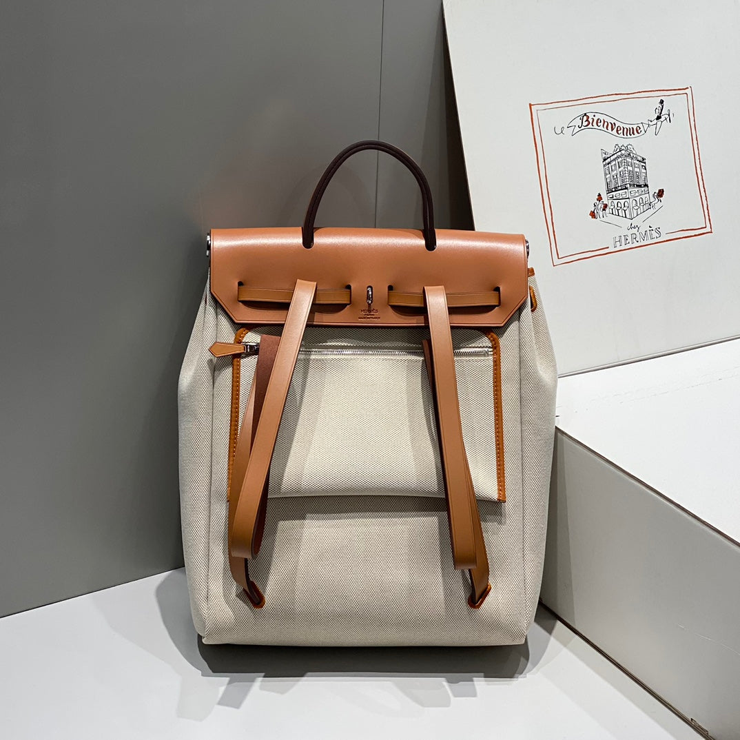 HERBAG A DOS ZIP RETOURNE BACKPACK 29 IN OFF-WHITE CANVAS AND BROWN CALFSKIN