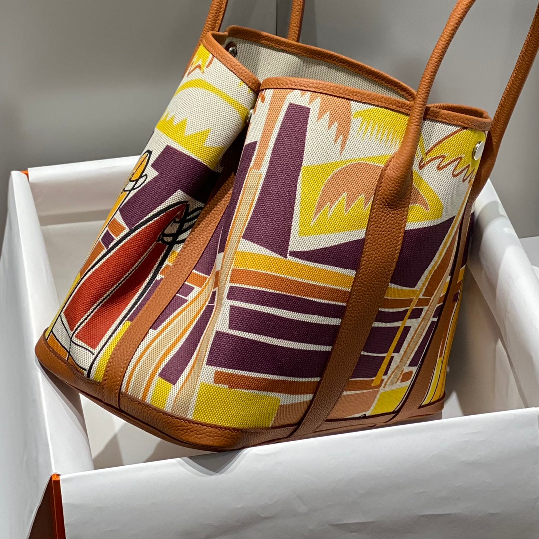 GARDEN PARTY 36 IN MULTICOLOR TOILE H CANVAS GOLD CALFSKIN TROPICAL STREETLINE ILLUSTRATION