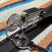 PICOTIN LOCK 18 BAG IN BLACK CALFSKIN ÉCRU/NOIR/FAUVE/NOIR/BLEU ZANZIBAR EMBROIDERY CANVAS