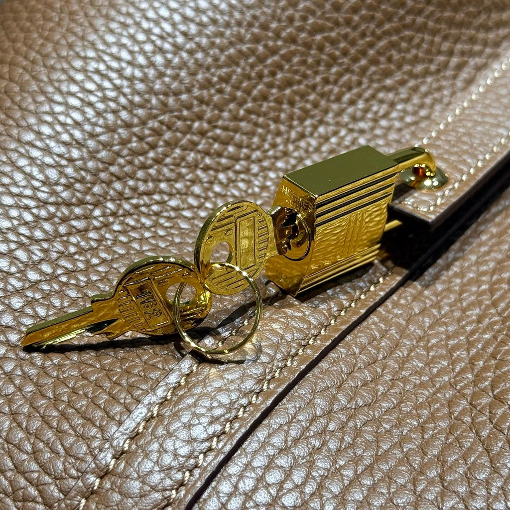 HERMES 25S PICOTIN LOCK 18 IN BURNT CARAMEL CALFSKIN GOLD HARDWARE