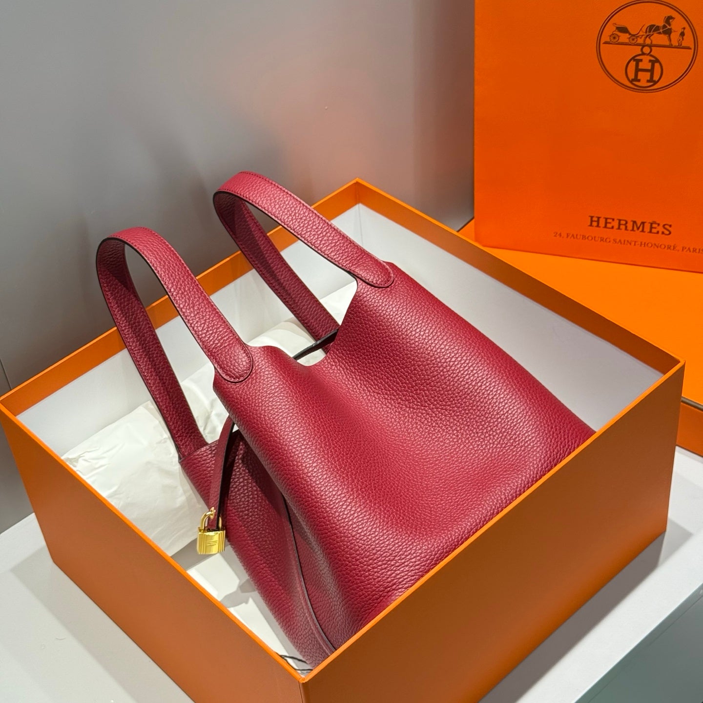 HERMES 25S PICOTIN LOCK 22 IN ROSSO ANCORA RED CALFSKIN GOLD HARDWARE