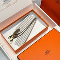 25S HERMES BAG STRAP BROWN AND WHITE PATTERN 85 IN CANVAS GOLD HARDWARE